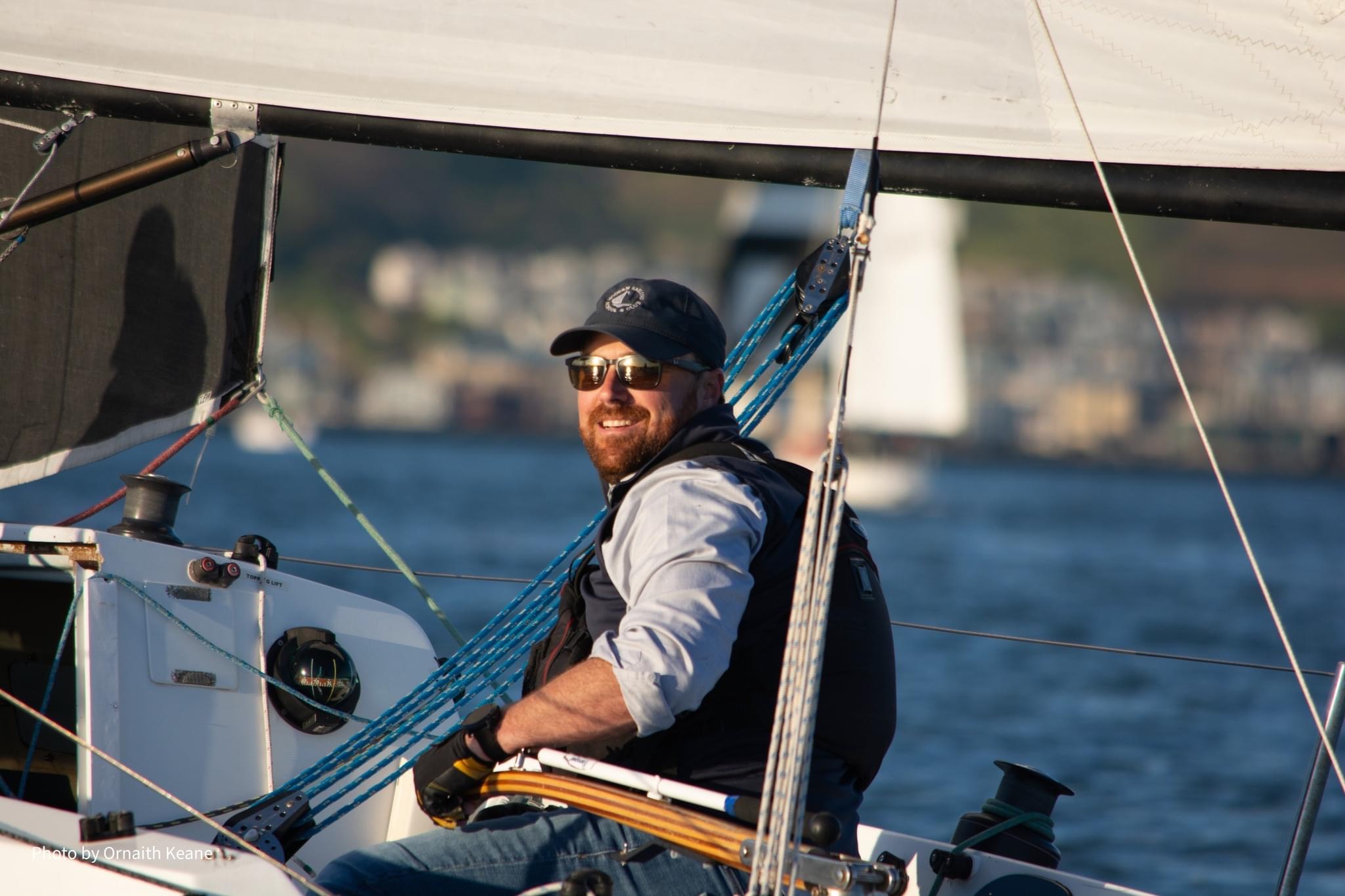 skipper at the helm