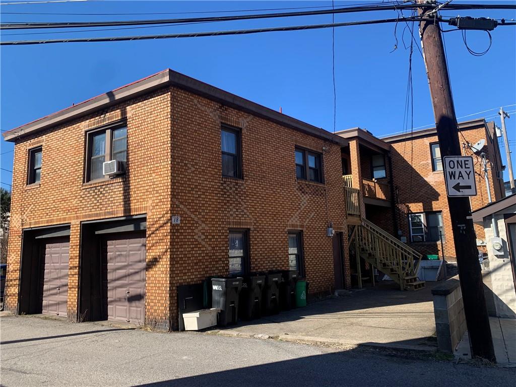 a view of a house with a garage