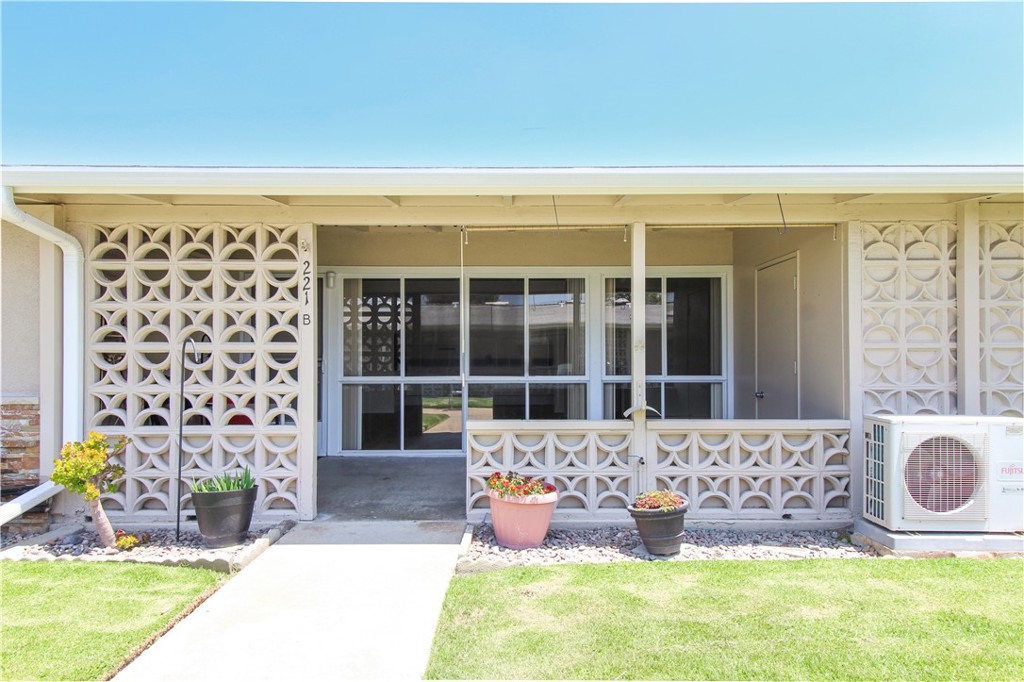 a front view of a house with patio