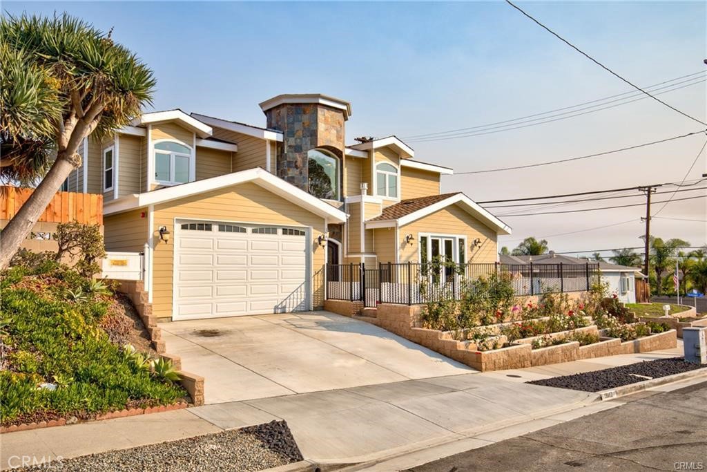 a front view of a house with a outdoor space