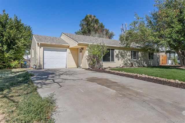 $425,000 | 9927 East 7th Avenue | Del Mar Parkway