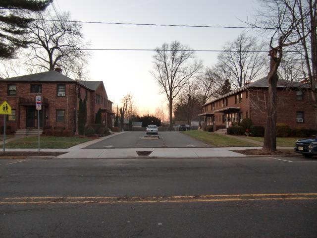 a view of street with houses