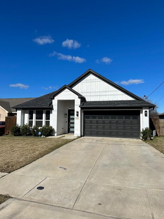 a front view of a house with yard