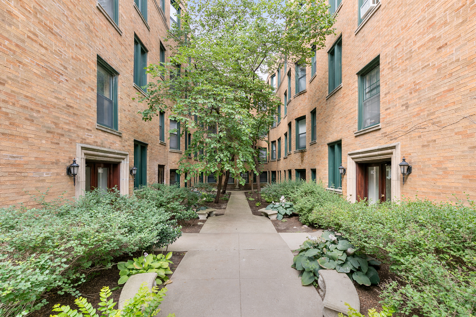 a view of outdoor space yard and front view of a building