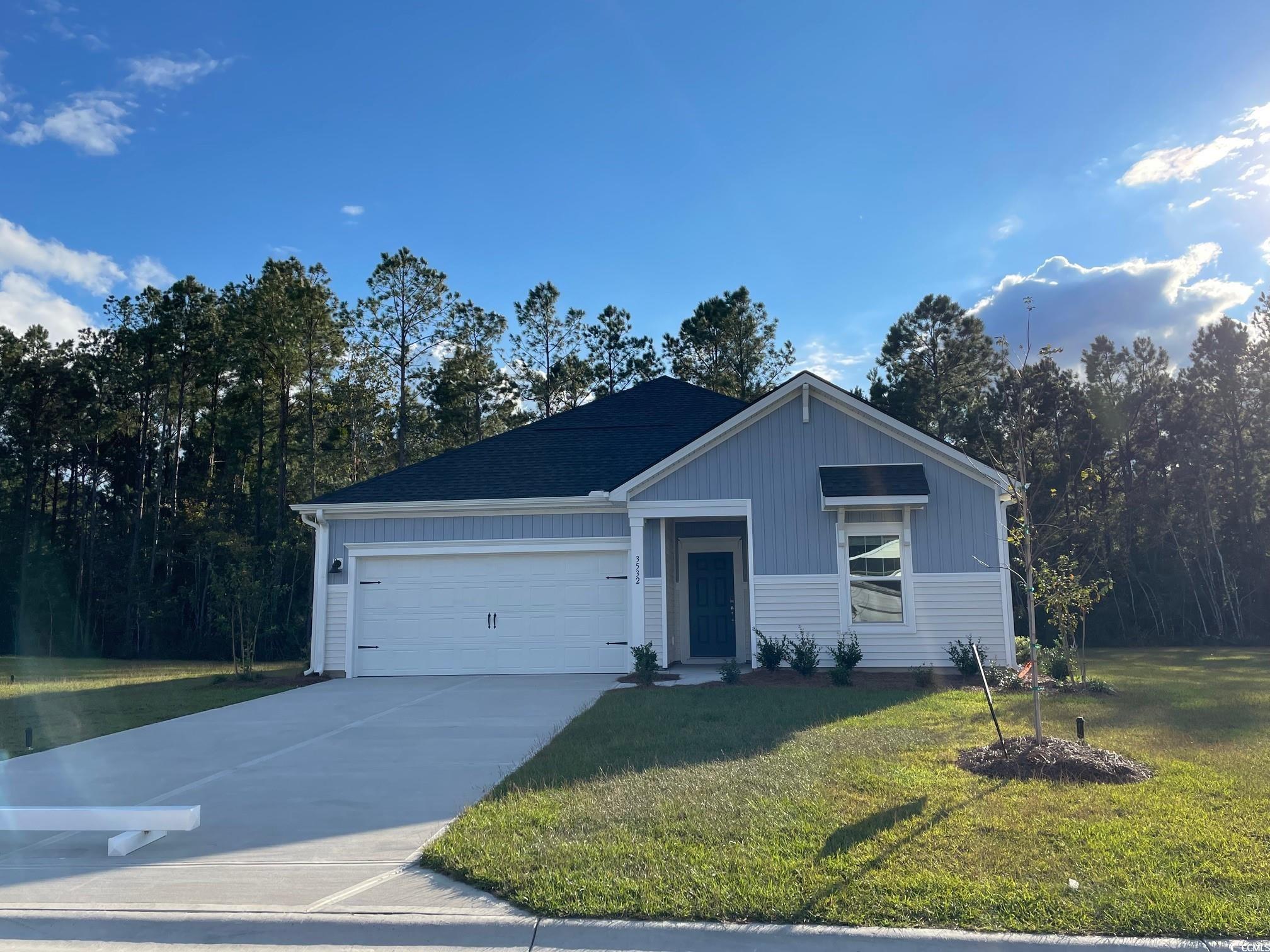 View of front of home featuring a front yard and a