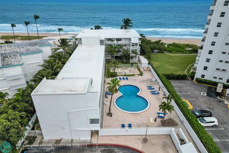 an aerial view of a house having yard