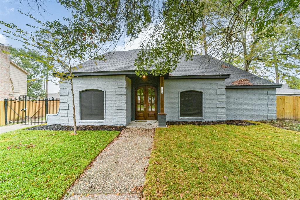 a front view of a house with yard