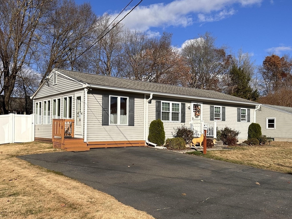 a front view of a house with a patio