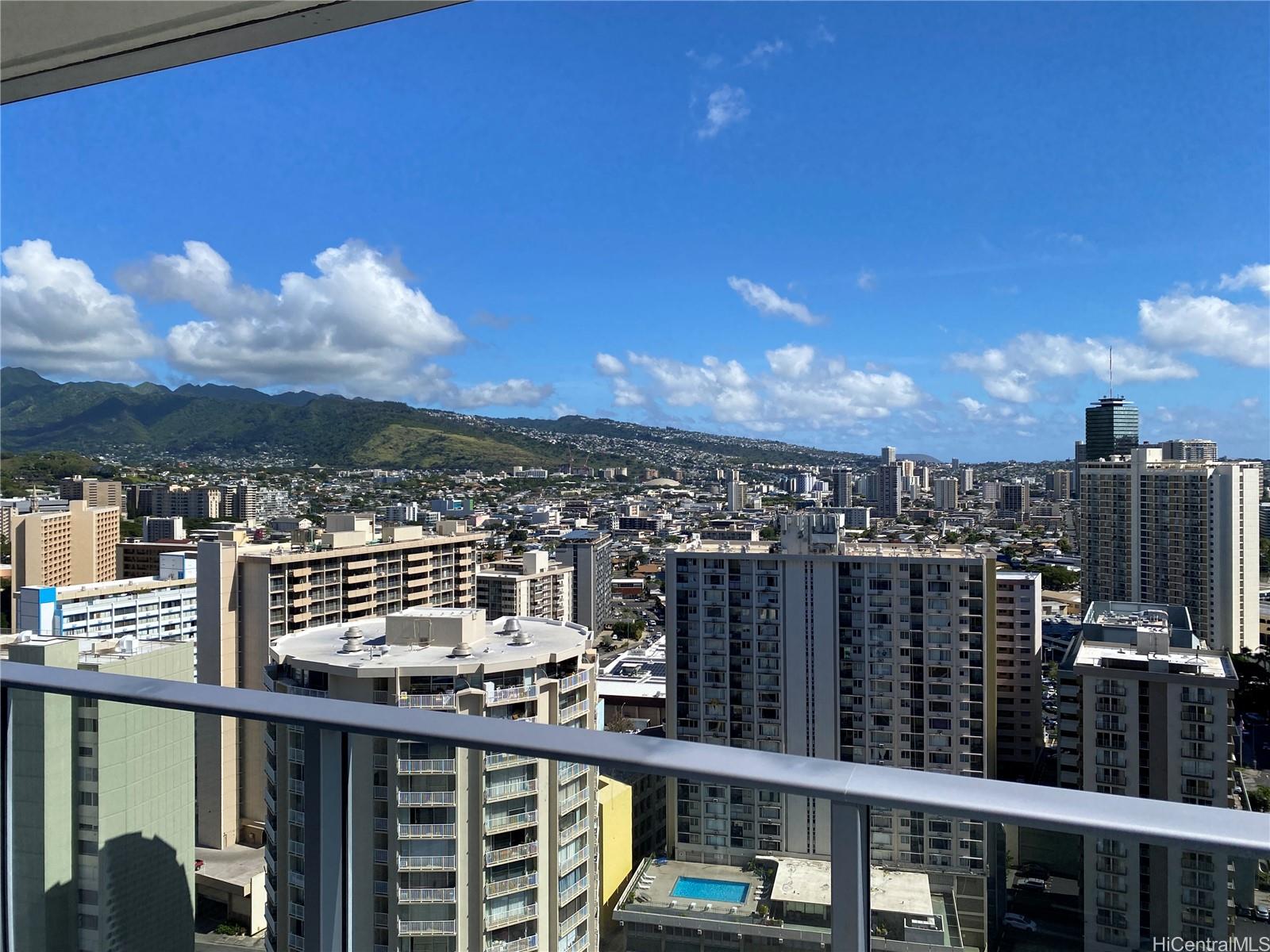 a view of a balcony with city view