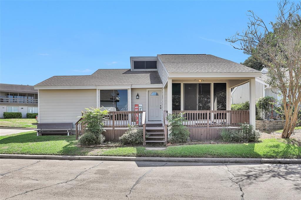 front view of a house and a yard