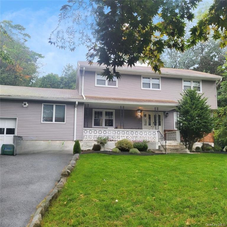 a front view of house with yard