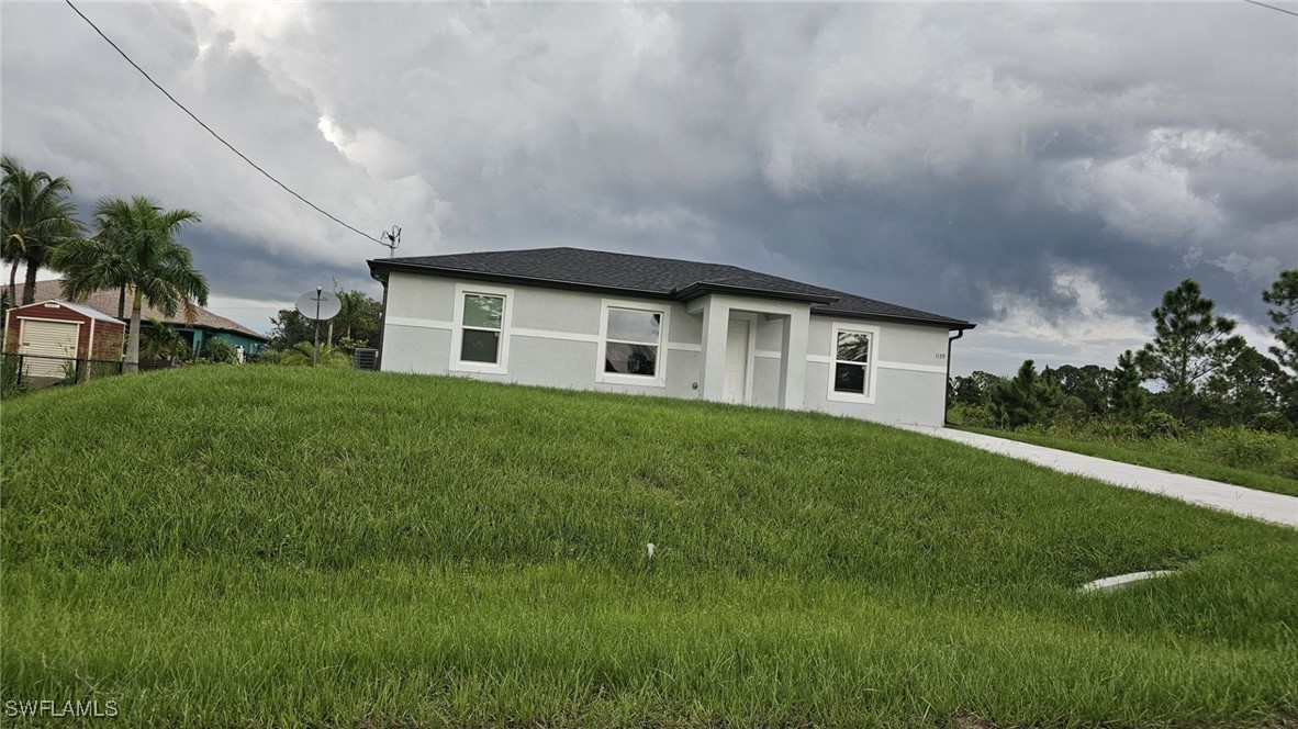 a house view with a garden space