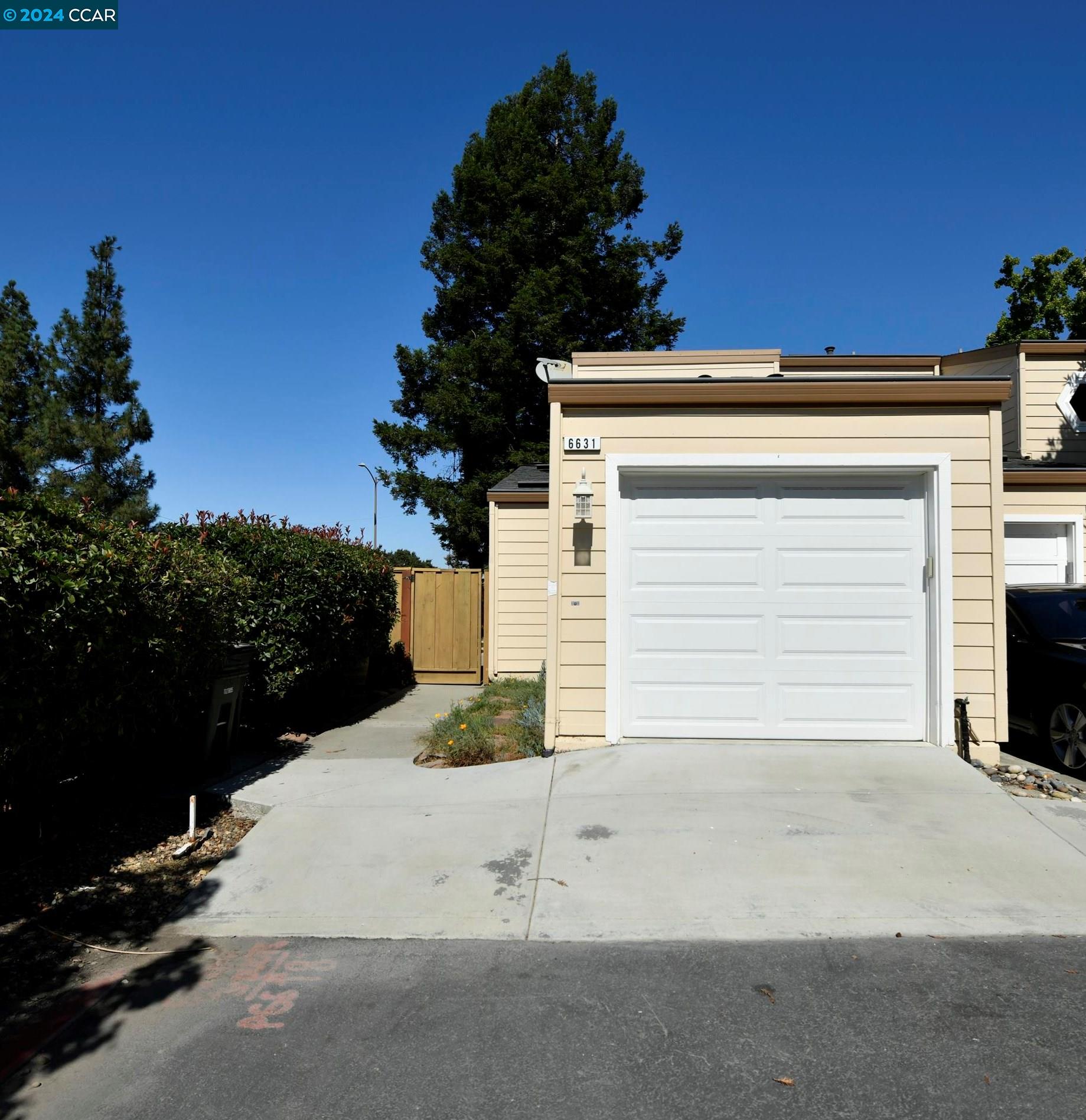 a view of a house with a garage