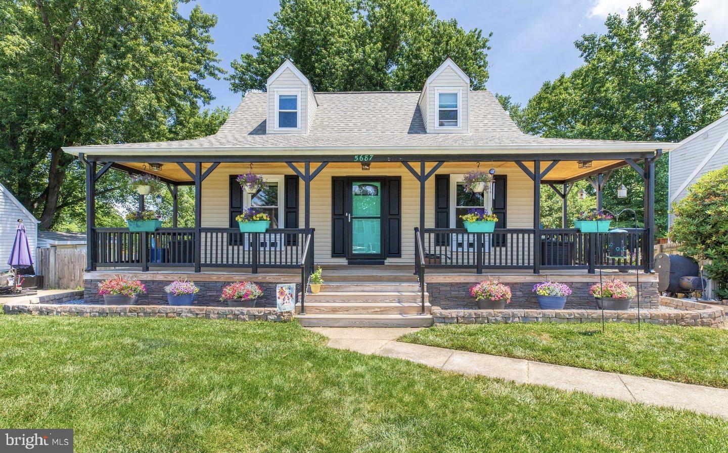 front view of house with a yard