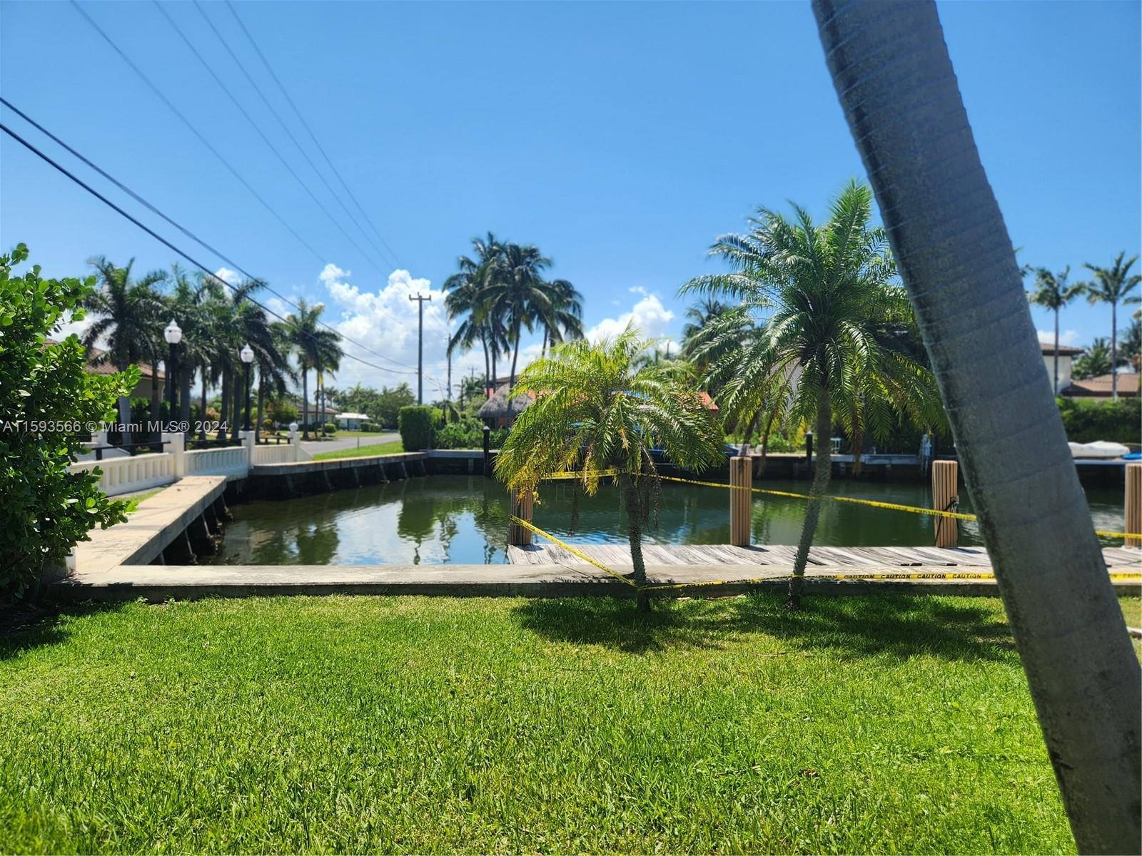 a view of swimming pool with a yard