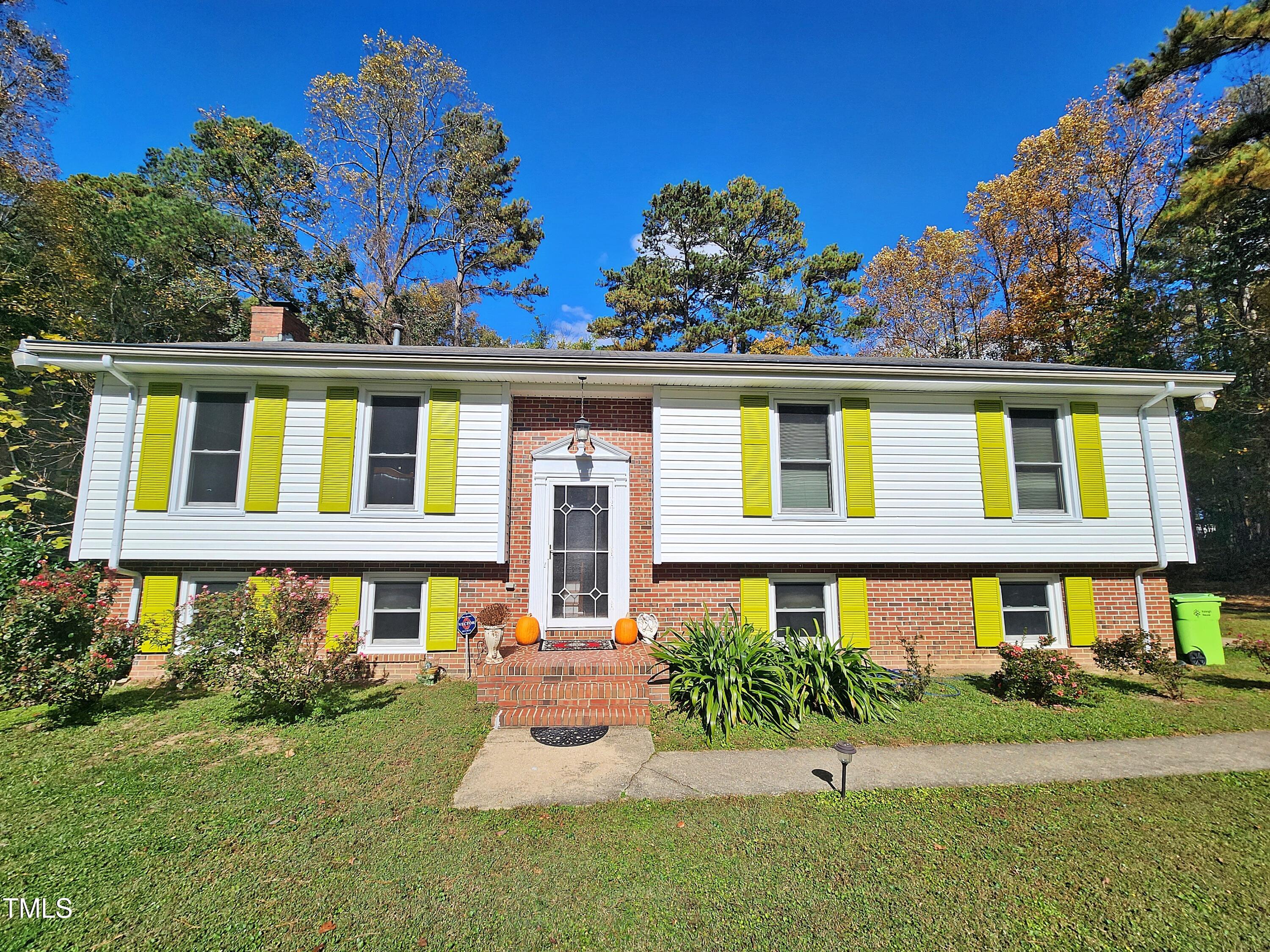 front view of a house with a yard