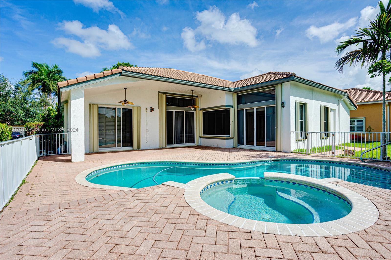 a front view of a house with swimming pool