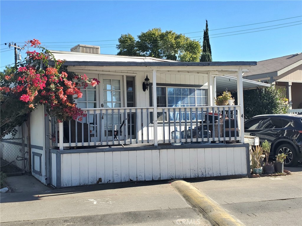 a view of a house with a porch