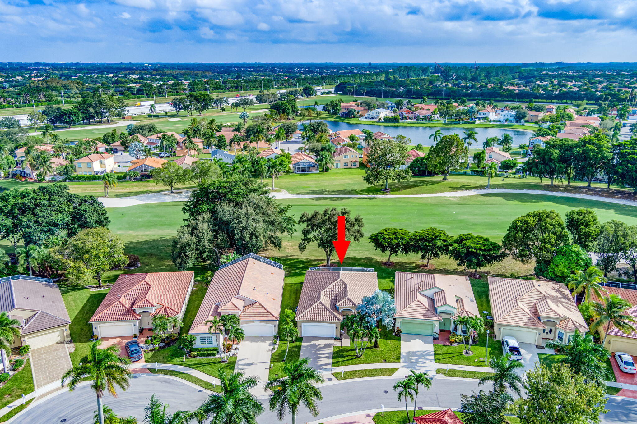 an aerial view of a houses with outdoor space and street view