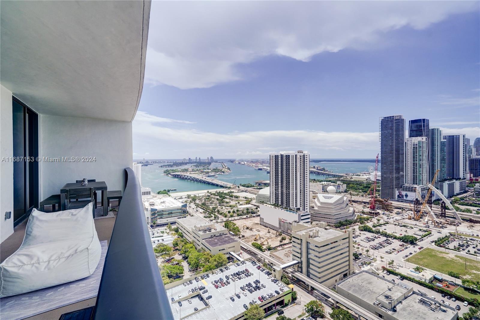 a view of city with tall buildings