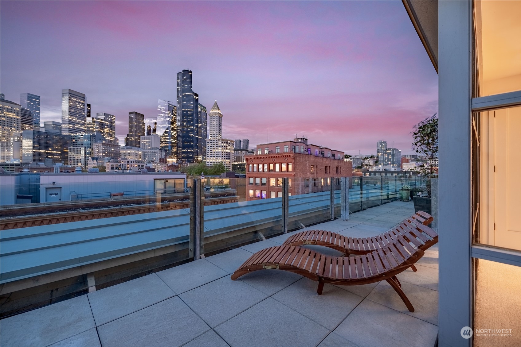 a view of a terrace with sitting area