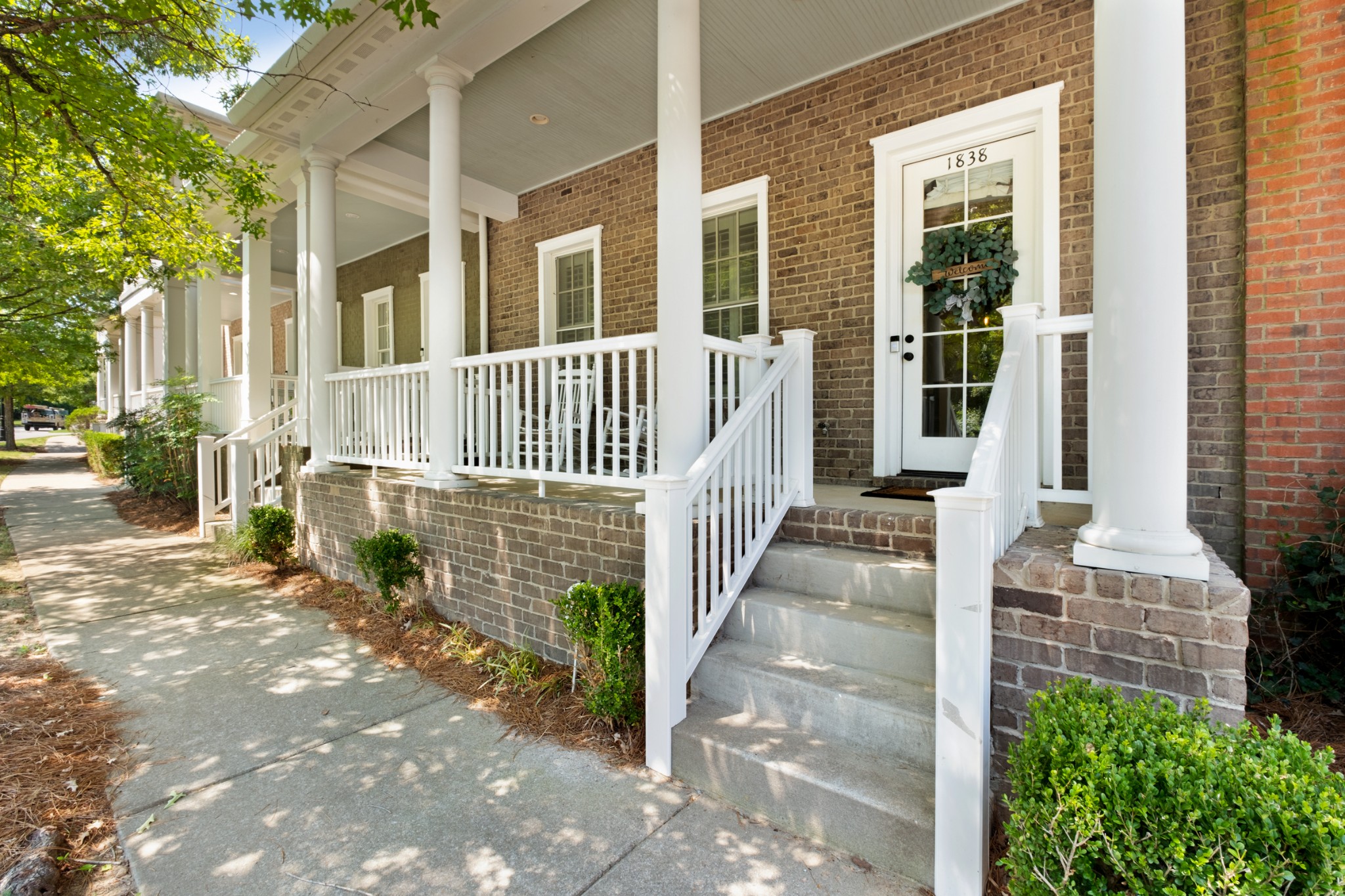 front view of a house with a porch