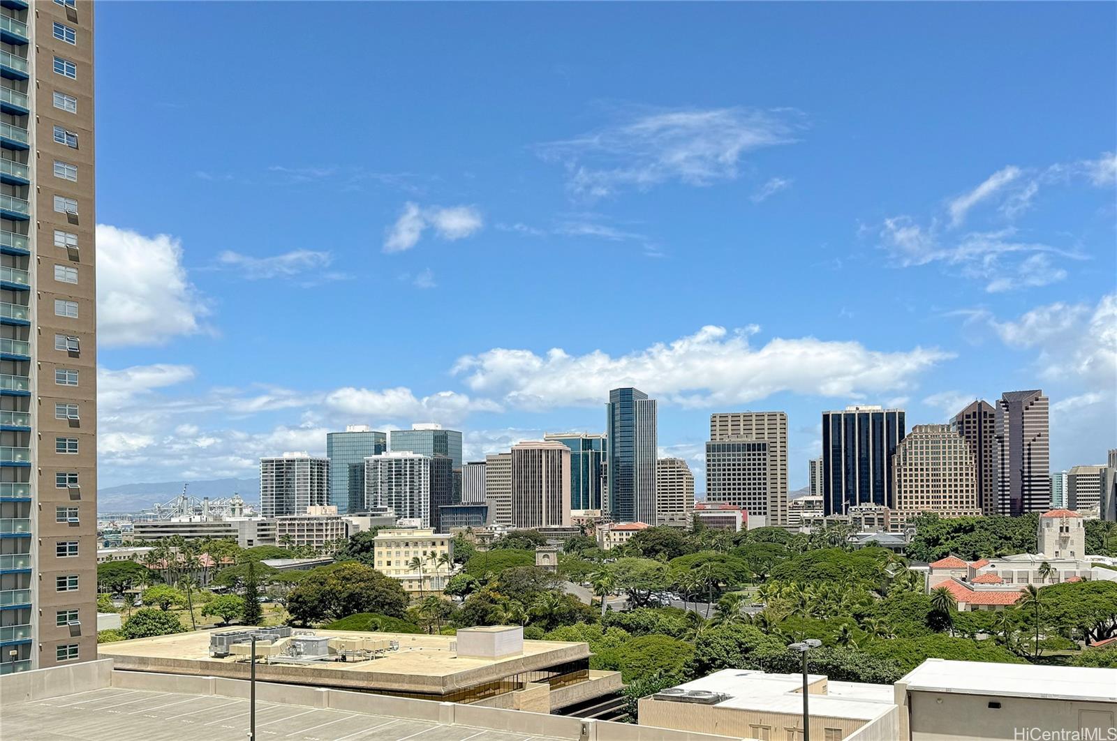 a view of a city with tall buildings