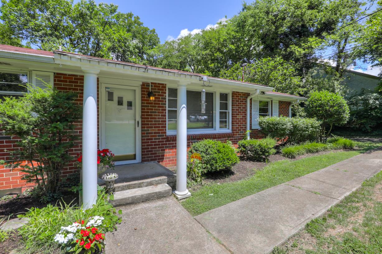 a front view of a house with a porch