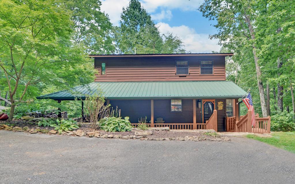 front view of a house with a garden