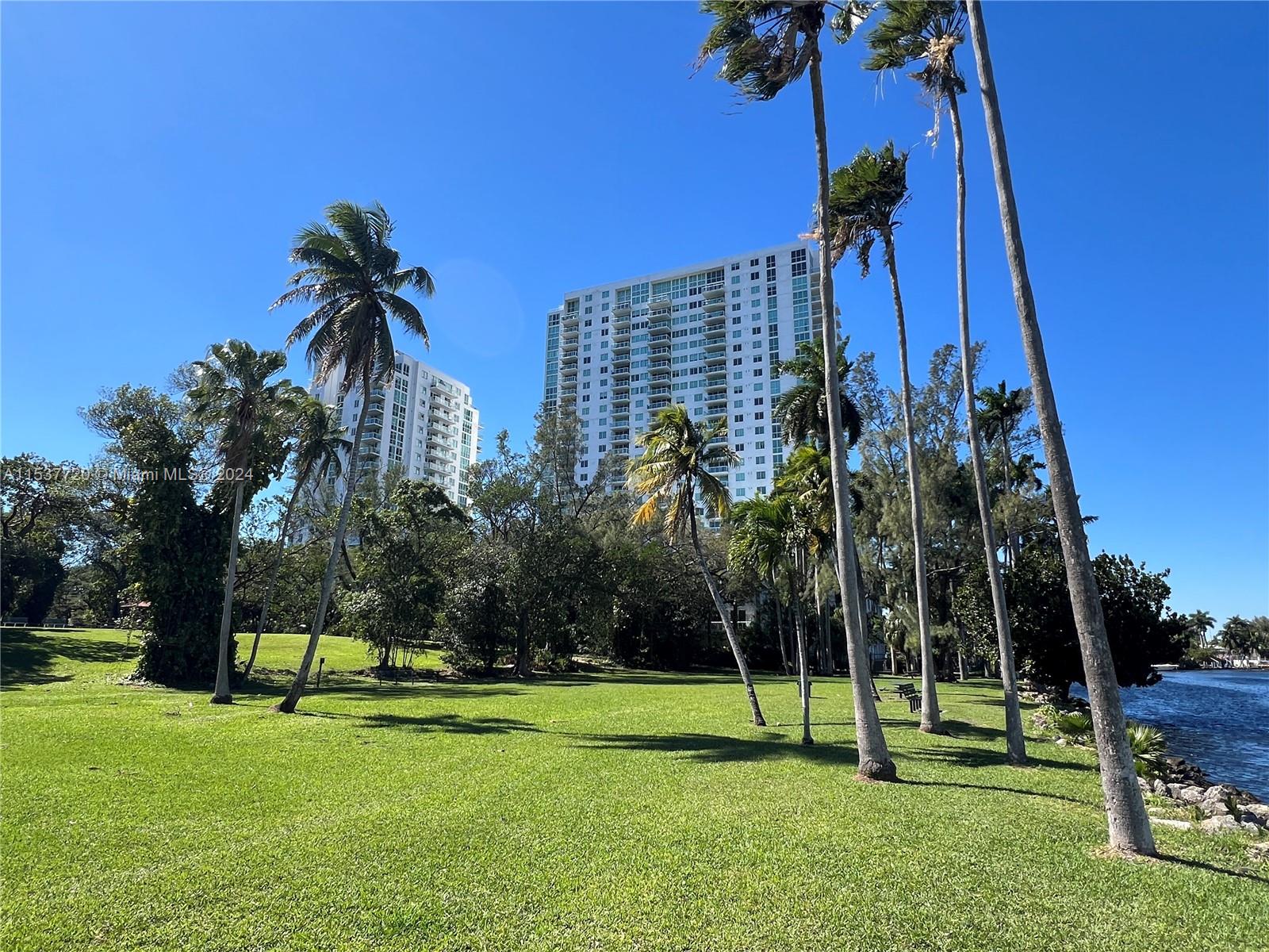 a view of a park and entertaining space