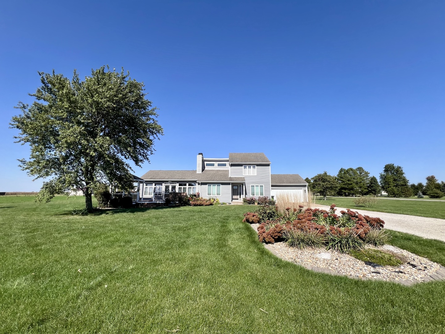 a view of a house with a big yard