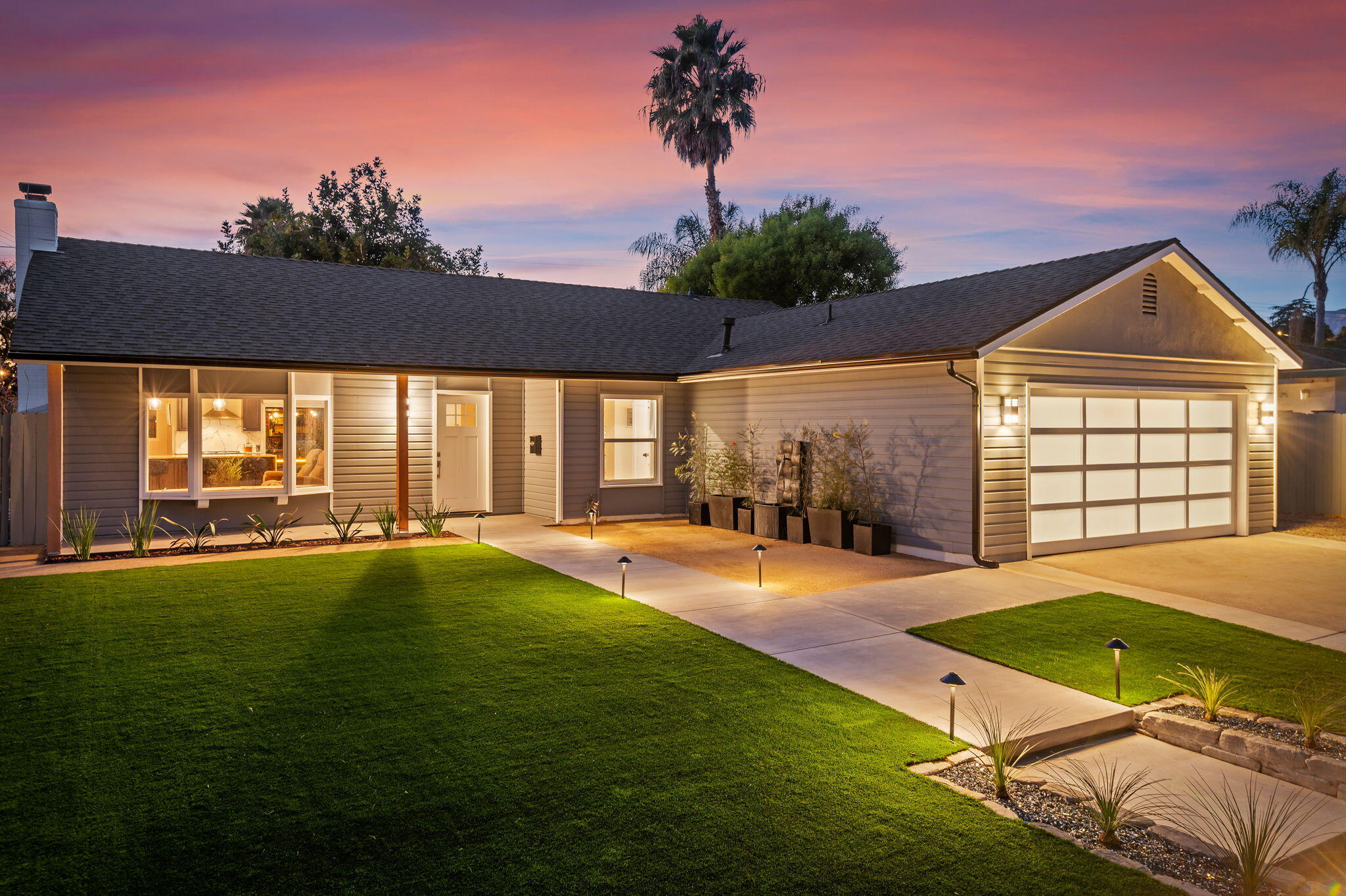 a swimming pool with outdoor seating and yard