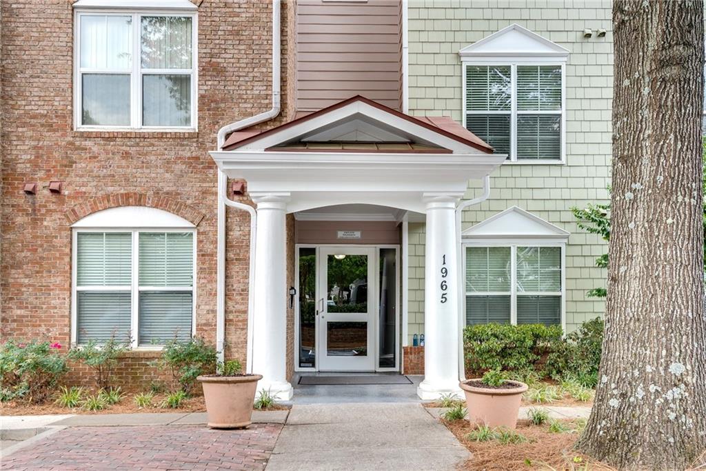 front view of a brick house with a window