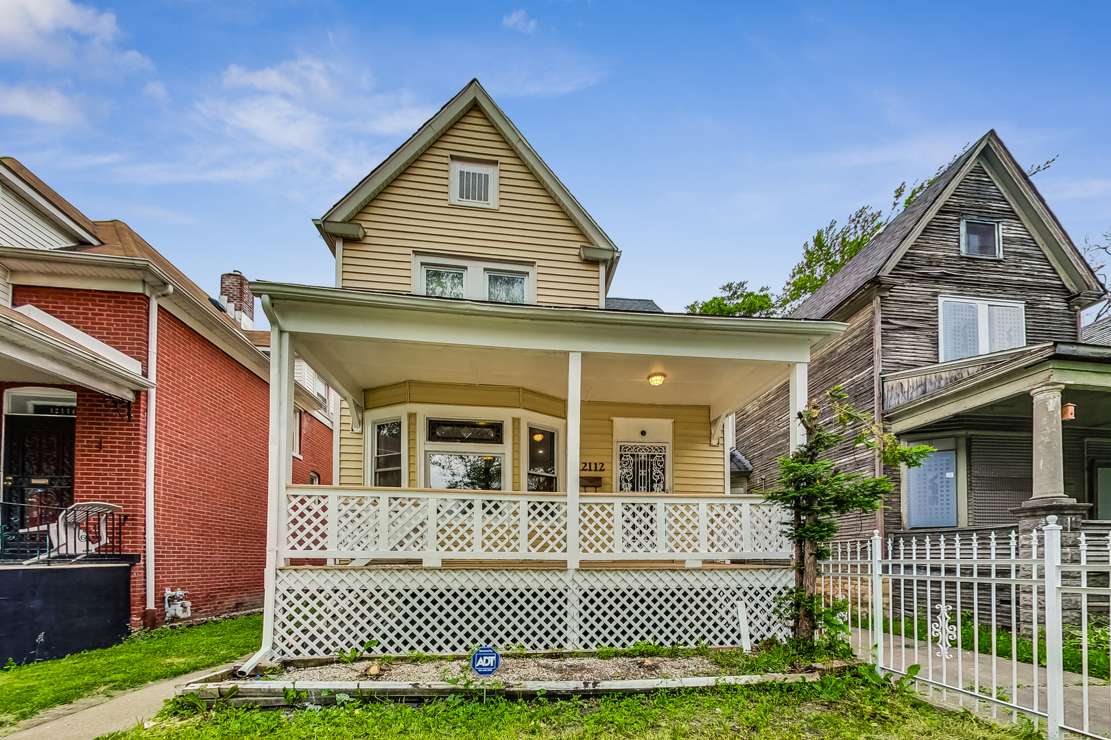 a front view of a house with a garage