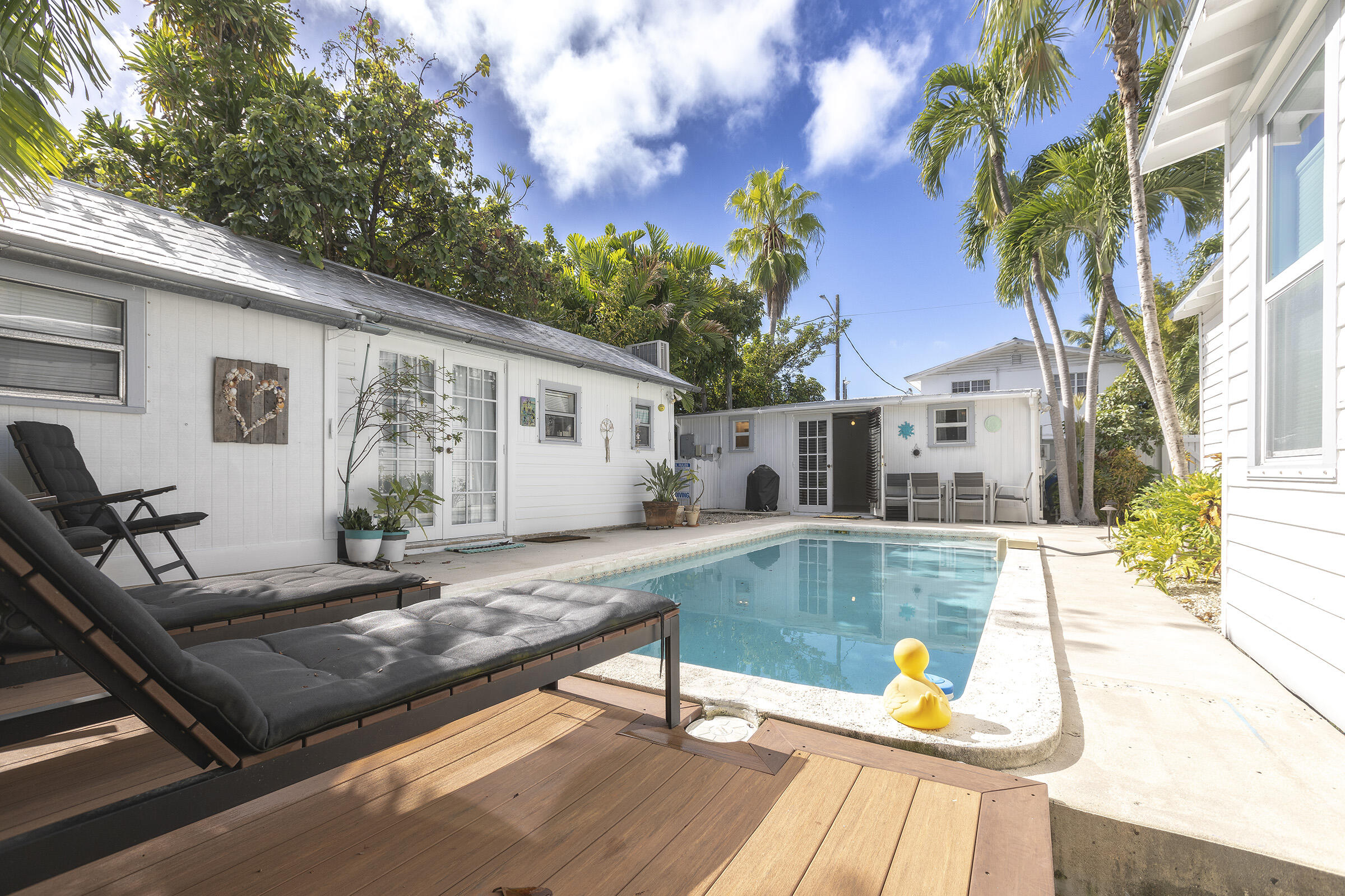 a view of a swimming pool with a patio