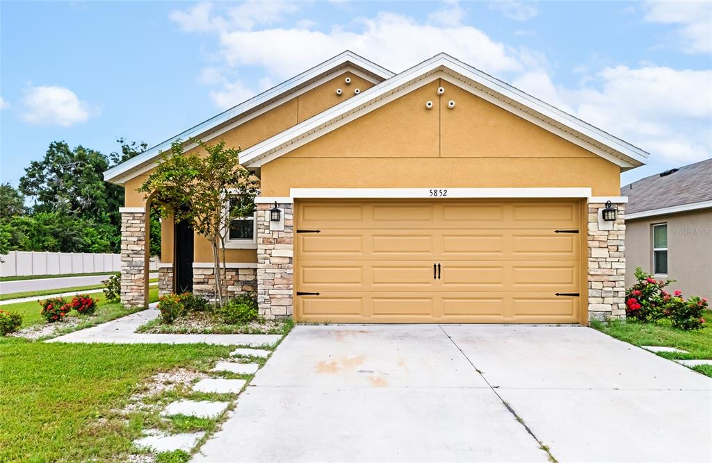 a front view of house with yard