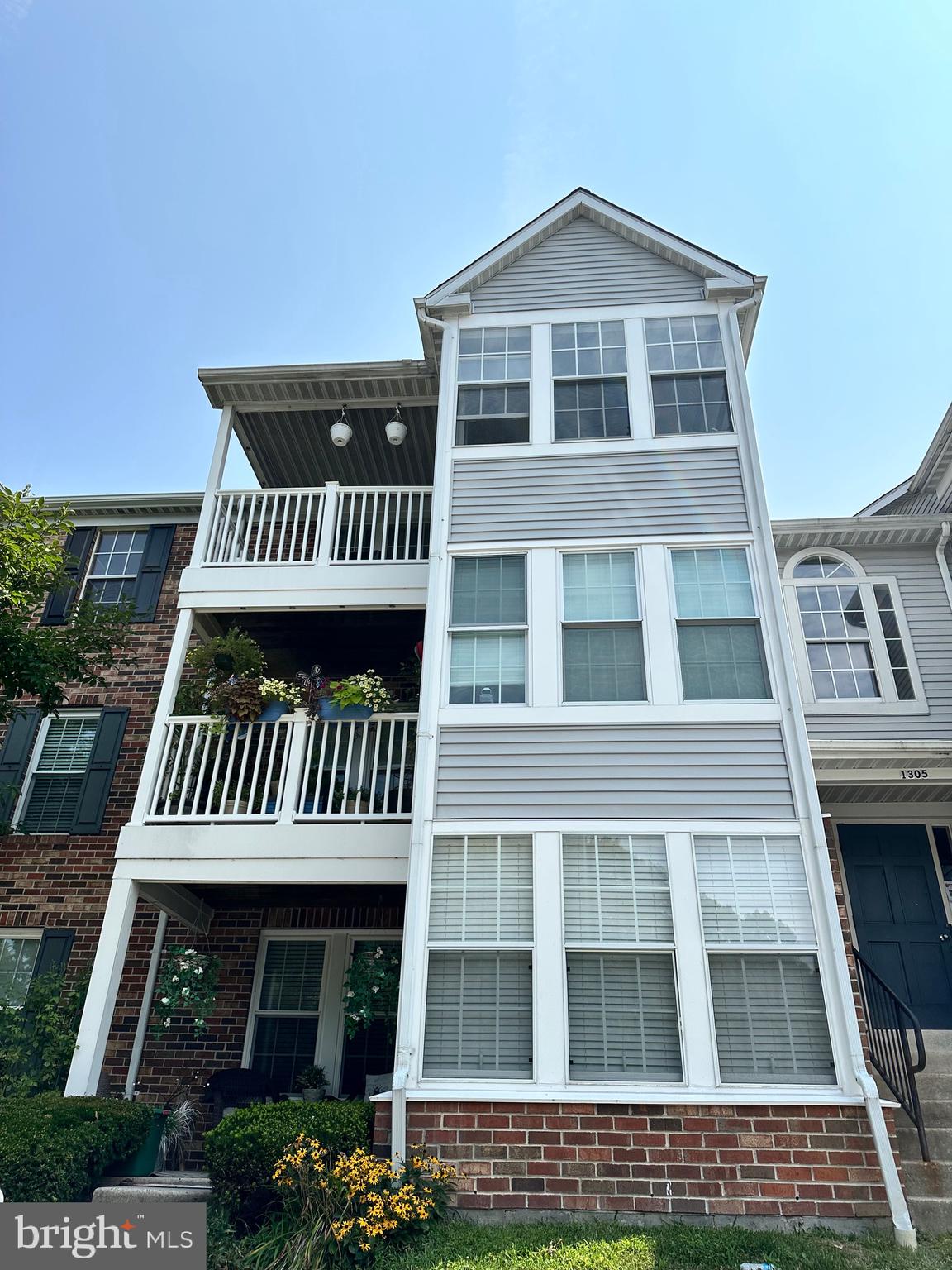 a front view of a house with a balcony