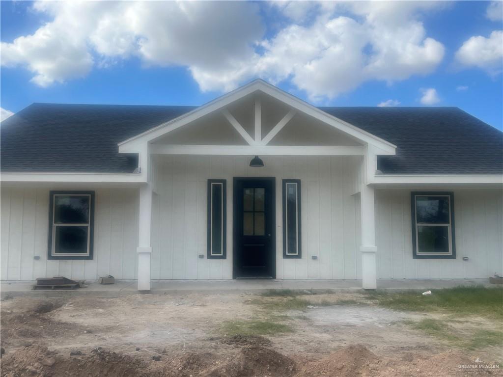 View of front of property featuring covered porch