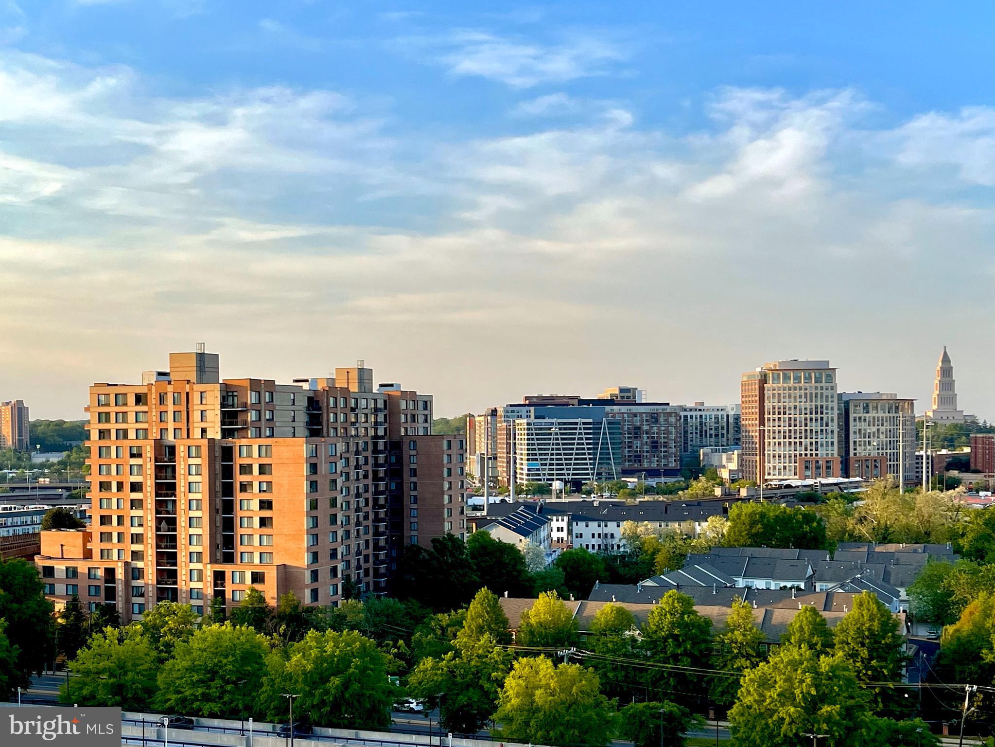 a view of a city with tall buildings