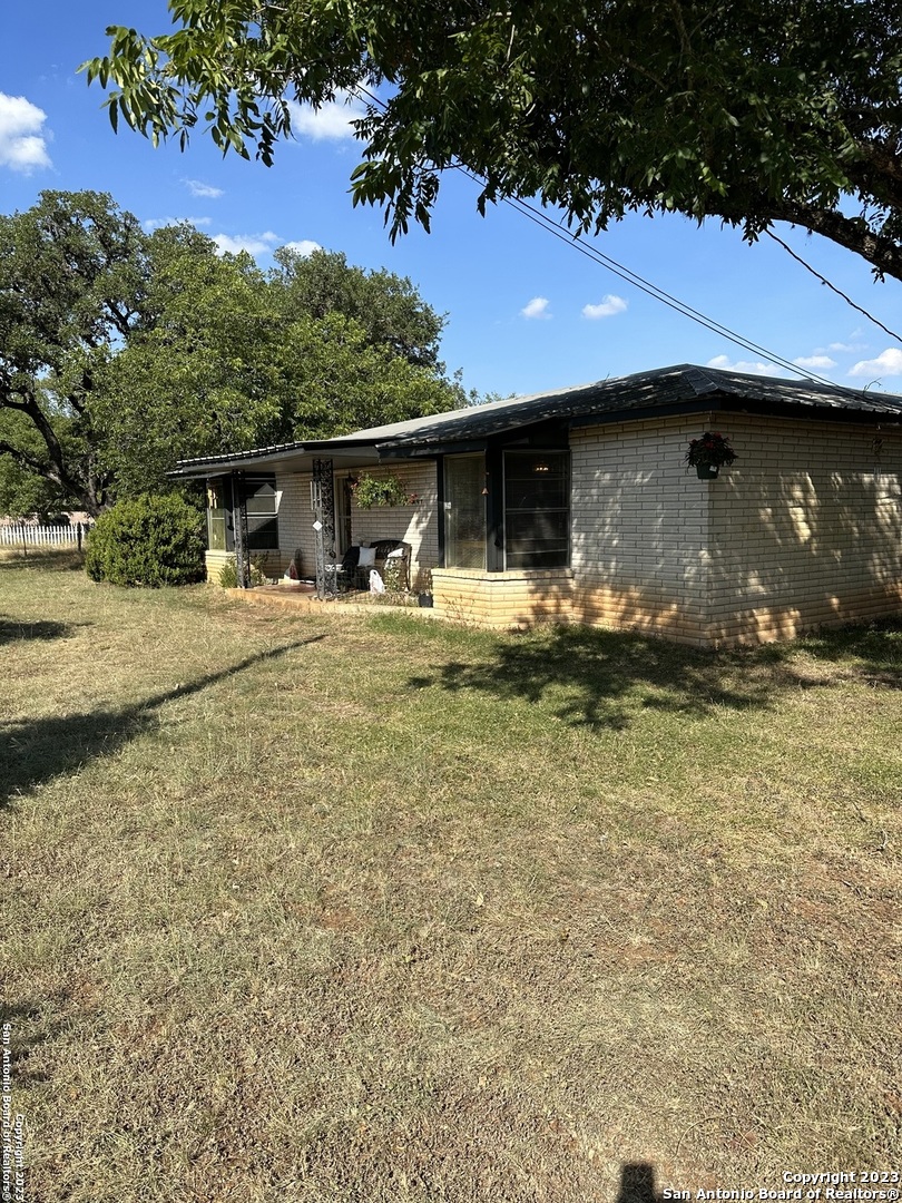 a house with yard in front of it