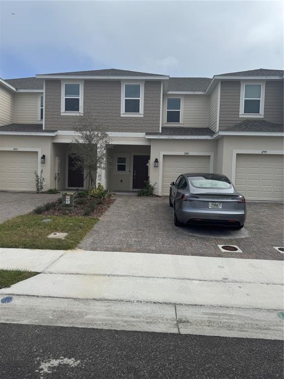 a car parked in front of a house