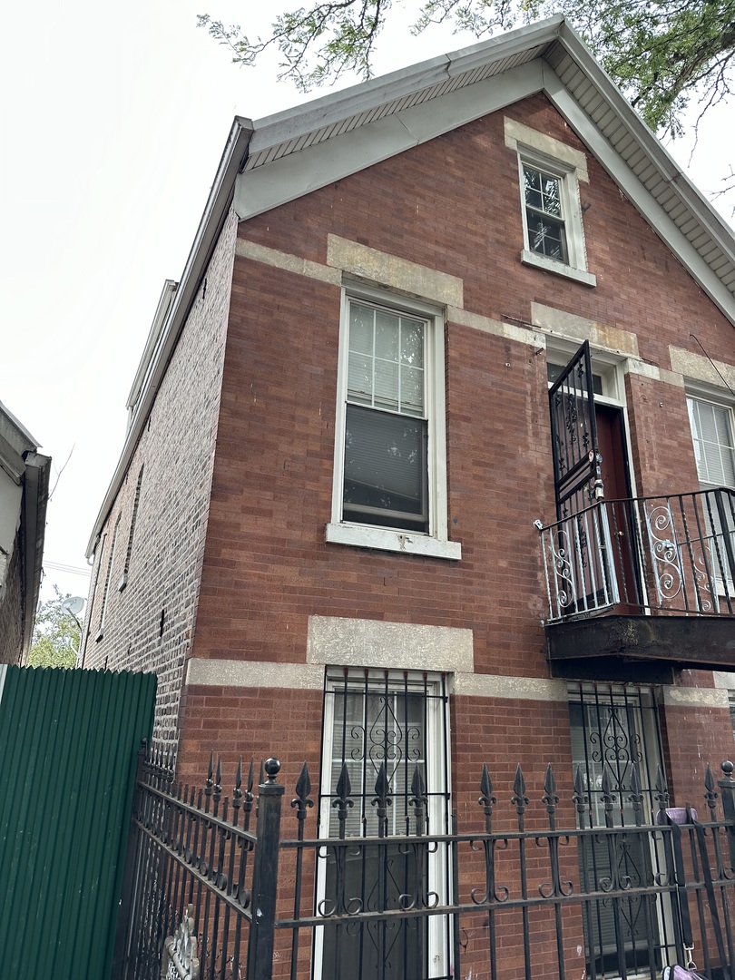 a brick building with a large windows