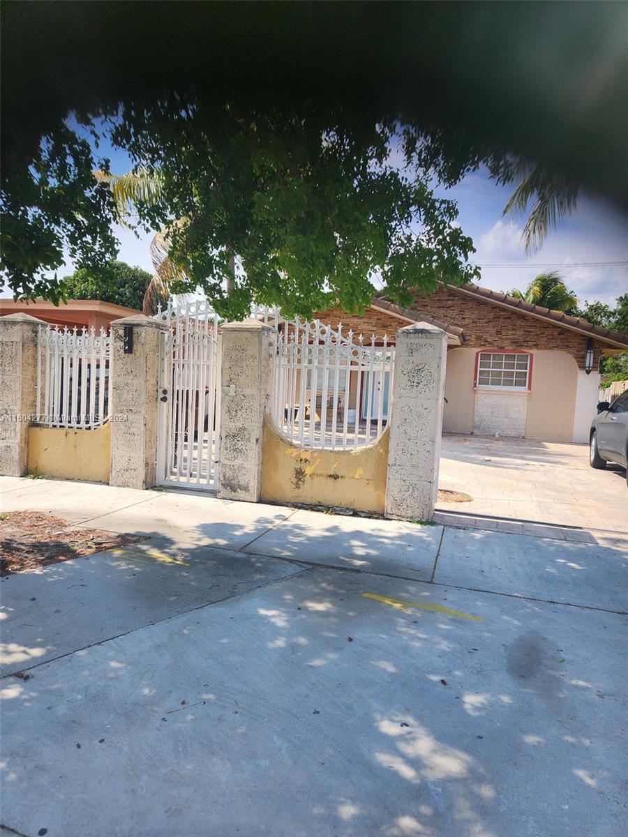 a front view of a house having yard