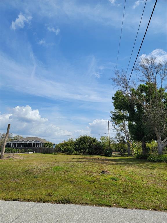 a view of a lake with a big yard