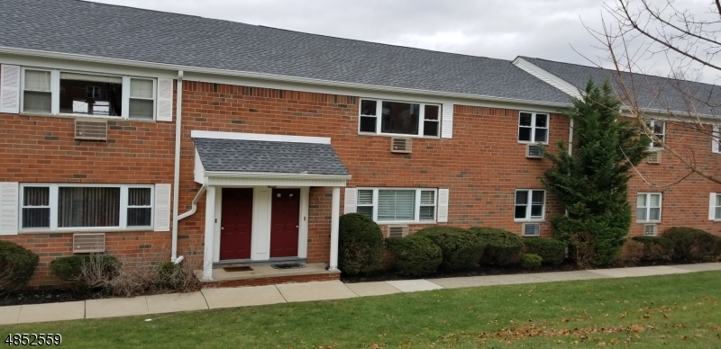 a view of front a house with a yard