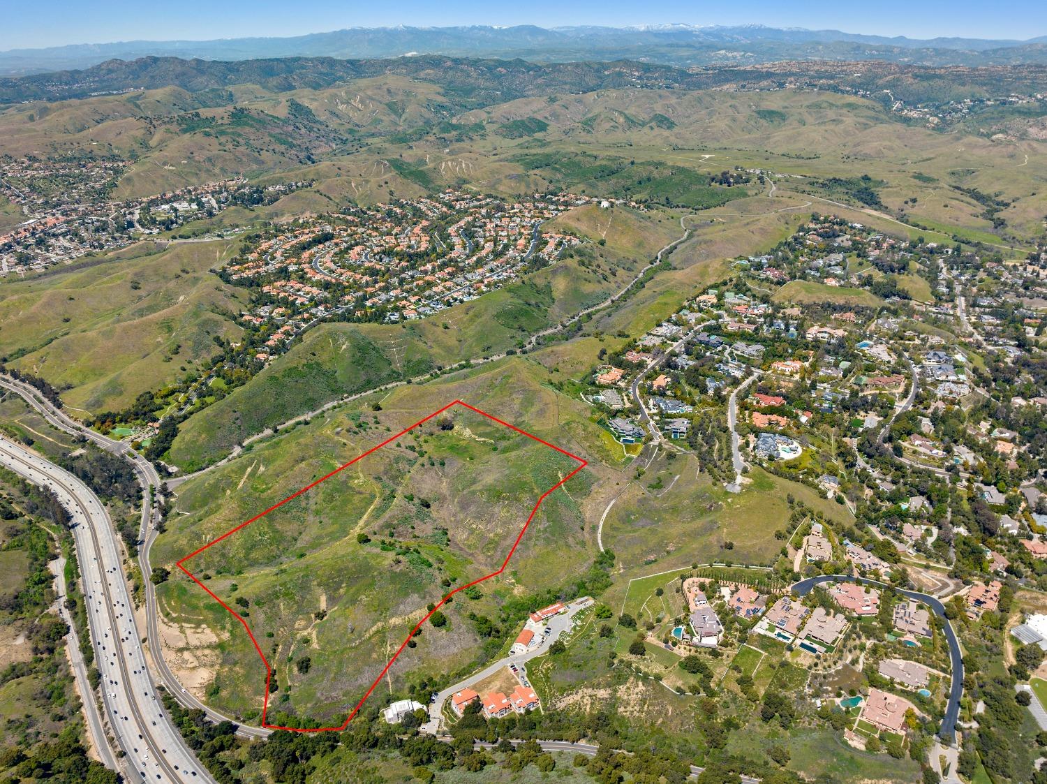 an aerial view of mountain with beach