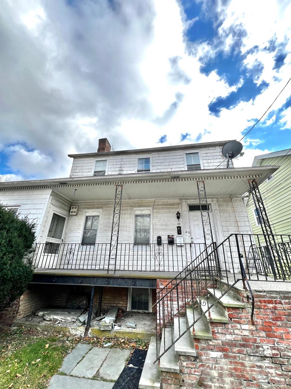 View of front facade featuring covered porch