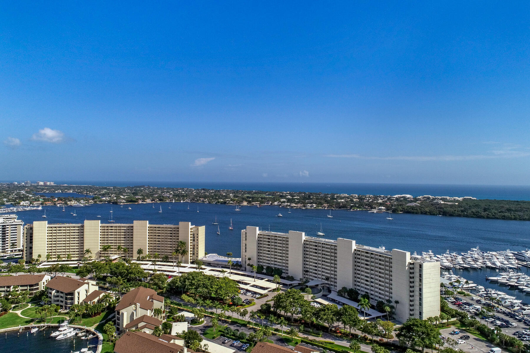 an aerial view of city and lake