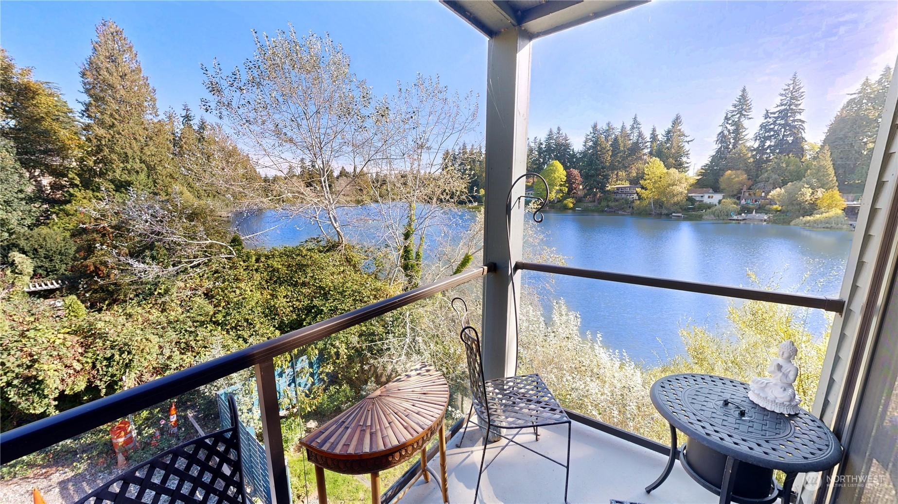 a view of a balcony with chairs