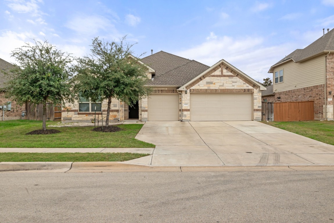 front view of a house and a yard